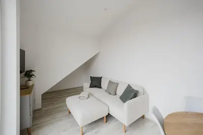 Ein Sitzbereich in der Unterkunft Mangfalltal Studios