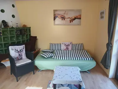 Ein Sitzbereich in der Unterkunft Ferienwohnung Dießen Bierdorf - Holzacker