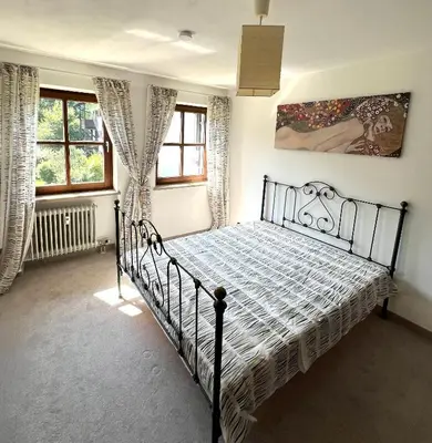 Ein Bett oder Betten in einem Zimmer der Unterkunft Ferienwohnung Am Kurpark