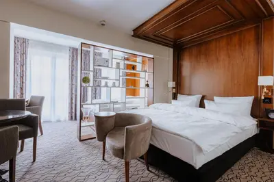 Ein Bett oder Betten in einem Zimmer der Unterkunft AdvaStay by KING's