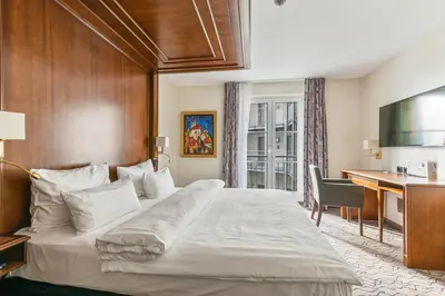 Ein Bett oder Betten in einem Zimmer der Unterkunft AdvaStay by KING's