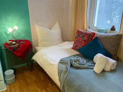 Ein Bett oder Betten in einem Zimmer der Unterkunft Fridas Room-Dein Rückzugsort