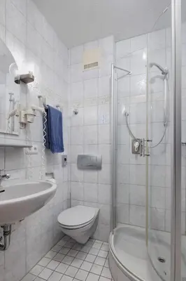 Ein Badezimmer in der Unterkunft Gasthaus & Hotel 