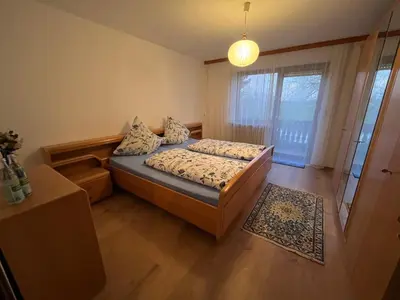 Ein Bett oder Betten in einem Zimmer der Unterkunft Wettinger Weiherbungalow