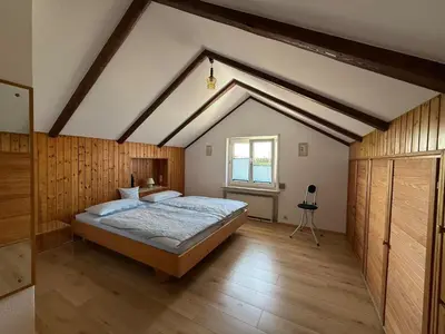 Ein Bett oder Betten in einem Zimmer der Unterkunft Ferienwohnung Feßler