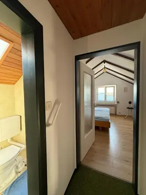 Ein Bett oder Betten in einem Zimmer der Unterkunft Ferienwohnung Feßler