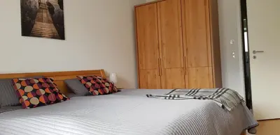 Ein Bett oder Betten in einem Zimmer der Unterkunft City Gallerie Apartment