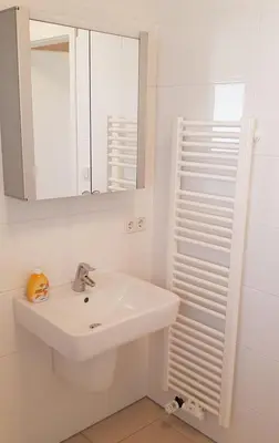 Ein Badezimmer in der Unterkunft City Gallerie Apartment