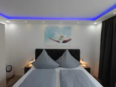 Ein Bett oder Betten in einem Zimmer der Unterkunft Modern Apartments Neuburg UU - NEU - 2 Zimmer, Komfort, Top Ausgestattet, Smart TV, Wi-Fi