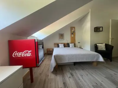 Ein Bett oder Betten in einem Zimmer der Unterkunft ciao-aschau Haus zur Burg Ap311
