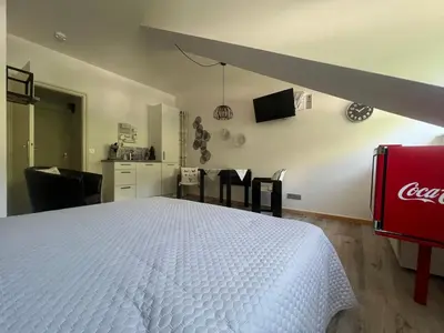 Ein Bett oder Betten in einem Zimmer der Unterkunft ciao-aschau Haus zur Burg Ap311