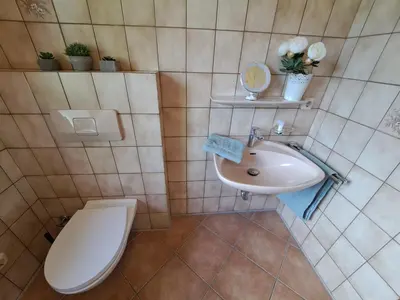 Ein Badezimmer in der Unterkunft Ferienwohnung See und Sonne
