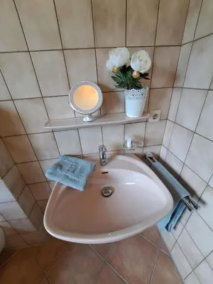 Ein Badezimmer in der Unterkunft Ferienwohnung See und Sonne