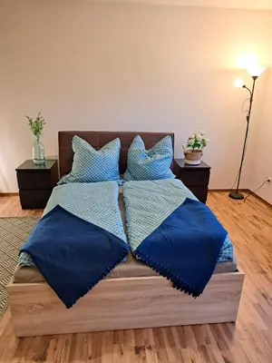 Ein Bett oder Betten in einem Zimmer der Unterkunft Ferienwohnung See und Sonne