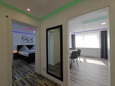 Ein Bett oder Betten in einem Zimmer der Unterkunft Modern Apartments Neuburg US - NEU - 2 Zimmer, Komfort, Top Ausgestattet, Smart TV, Wi-Fi