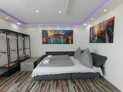Ein Bett oder Betten in einem Zimmer der Unterkunft Modern Apartments Neuburg US - NEU - 2 Zimmer, Komfort, Top Ausgestattet, Smart TV, Wi-Fi