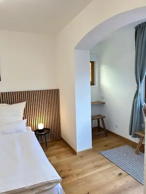Ein Bett oder Betten in einem Zimmer der Unterkunft Ferienwohnung griabighoch2 - Dahoam auf Zeit