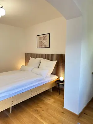 Ein Bett oder Betten in einem Zimmer der Unterkunft Ferienwohnung griabighoch2 - Dahoam auf Zeit