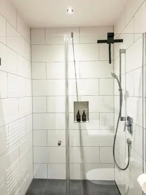 Ein Badezimmer in der Unterkunft Deluxe-Wohnung in Wasserburg Bahnhof - 94m2 - Smart TV - Terrasse - NEU