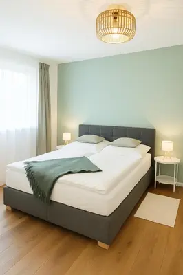Ein Bett oder Betten in einem Zimmer der Unterkunft RuheTraum 80 - Design-Apartment