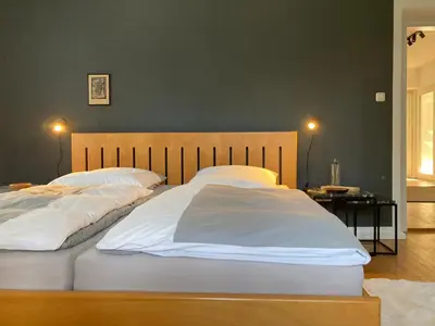 Ein Bett oder Betten in einem Zimmer der Unterkunft Altstadt-Domizil-Friedberg