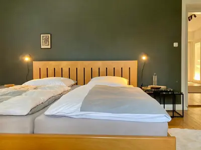 Ein Bett oder Betten in einem Zimmer der Unterkunft Altstadt-Domizil-Friedberg
