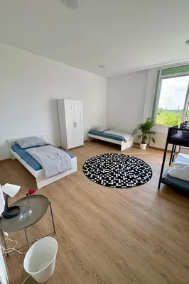 Ein Bett oder Betten in einem Zimmer der Unterkunft Brightestate Apartments