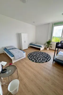 Ein Bett oder Betten in einem Zimmer der Unterkunft Brightestate Apartments