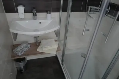 Ein Badezimmer in der Unterkunft Hotel Stern