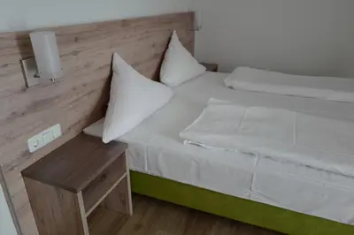 Ein Bett oder Betten in einem Zimmer der Unterkunft Hotel Stern