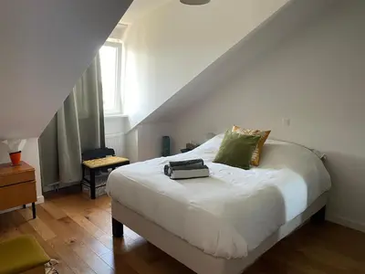 Ein Bett oder Betten in einem Zimmer der Unterkunft Cozy apartment in Munich