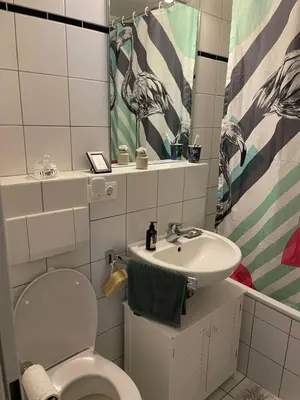 Ein Badezimmer in der Unterkunft Cozy apartment in Munich
