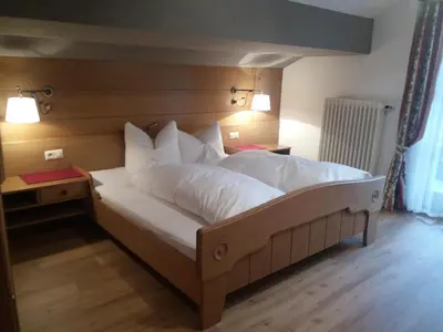 Ein Bett oder Betten in einem Zimmer der Unterkunft Gästehaus Zunterer