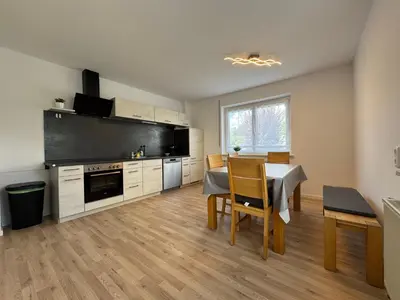 Küche/Küchenzeile in der Unterkunft WundP Living Wohnung mit Terrasse Parkplatz