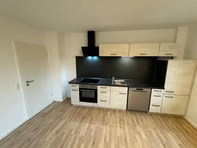 Küche/Küchenzeile in der Unterkunft WundP Living Wohnung mit Terrasse Parkplatz