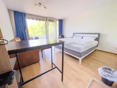 Ein Bett oder Betten in einem Zimmer der Unterkunft Ruhiges Apartment, Balkon, U-Bahn