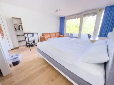 Ein Bett oder Betten in einem Zimmer der Unterkunft Ruhiges Apartment, Balkon, U-Bahn