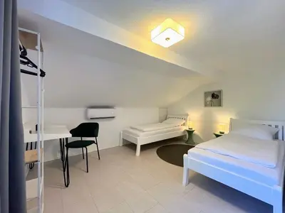 Ein Bett oder Betten in einem Zimmer der Unterkunft 4Bed I Klima I 3 Room I Wash I Küche I Parkplatz