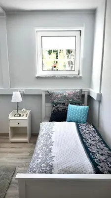 Ein Bett oder Betten in einem Zimmer der Unterkunft Ferienwohnung Landshut am Gambach