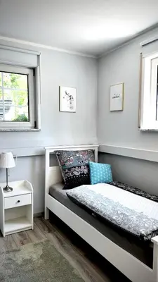 Ein Bett oder Betten in einem Zimmer der Unterkunft Ferienwohnung Landshut am Gambach