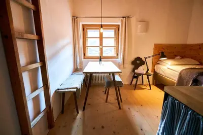 Ein Bett oder Betten in einem Zimmer der Unterkunft WASCHHAUS - Ferienhaus in Grassau im Chiemgau