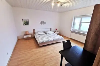 Ein Bett oder Betten in einem Zimmer der Unterkunft Munich-Salzburg Mountain Gateway