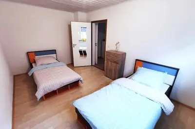Ein Bett oder Betten in einem Zimmer der Unterkunft Munich-Salzburg Mountain Gateway