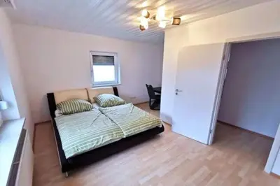 Ein Bett oder Betten in einem Zimmer der Unterkunft Munich-Salzburg Mountain Gateway