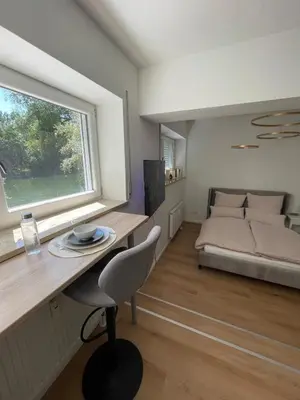 Ein Bett oder Betten in einem Zimmer der Unterkunft Cozy studio apartment