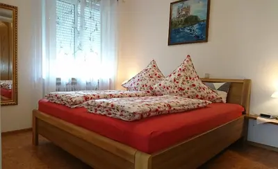 Ein Bett oder Betten in einem Zimmer der Unterkunft Ferienwohnung (80qm/WNFl) in 86825 Bad Wörishofen(Zentrum)