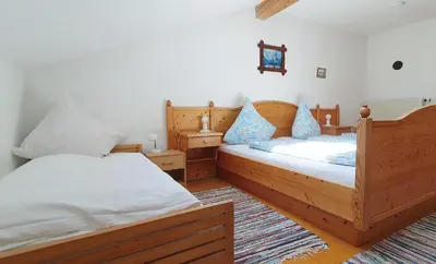 Ein Bett oder Betten in einem Zimmer der Unterkunft Hechlhof