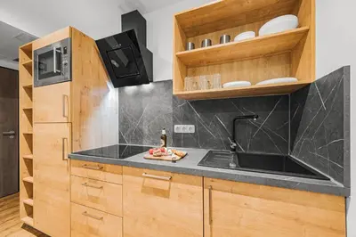 Küche/Küchenzeile in der Unterkunft Creativ Wohnen Apartmenthaus Forstinning