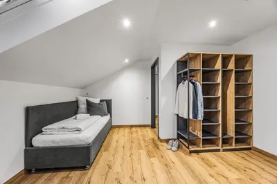 Ein Bett oder Betten in einem Zimmer der Unterkunft Creativ Wohnen Apartmenthaus Forstinning