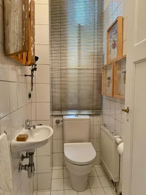 Ein Badezimmer in der Unterkunft Aussergewöhnlich schönes Zimmer in München-Schwabing